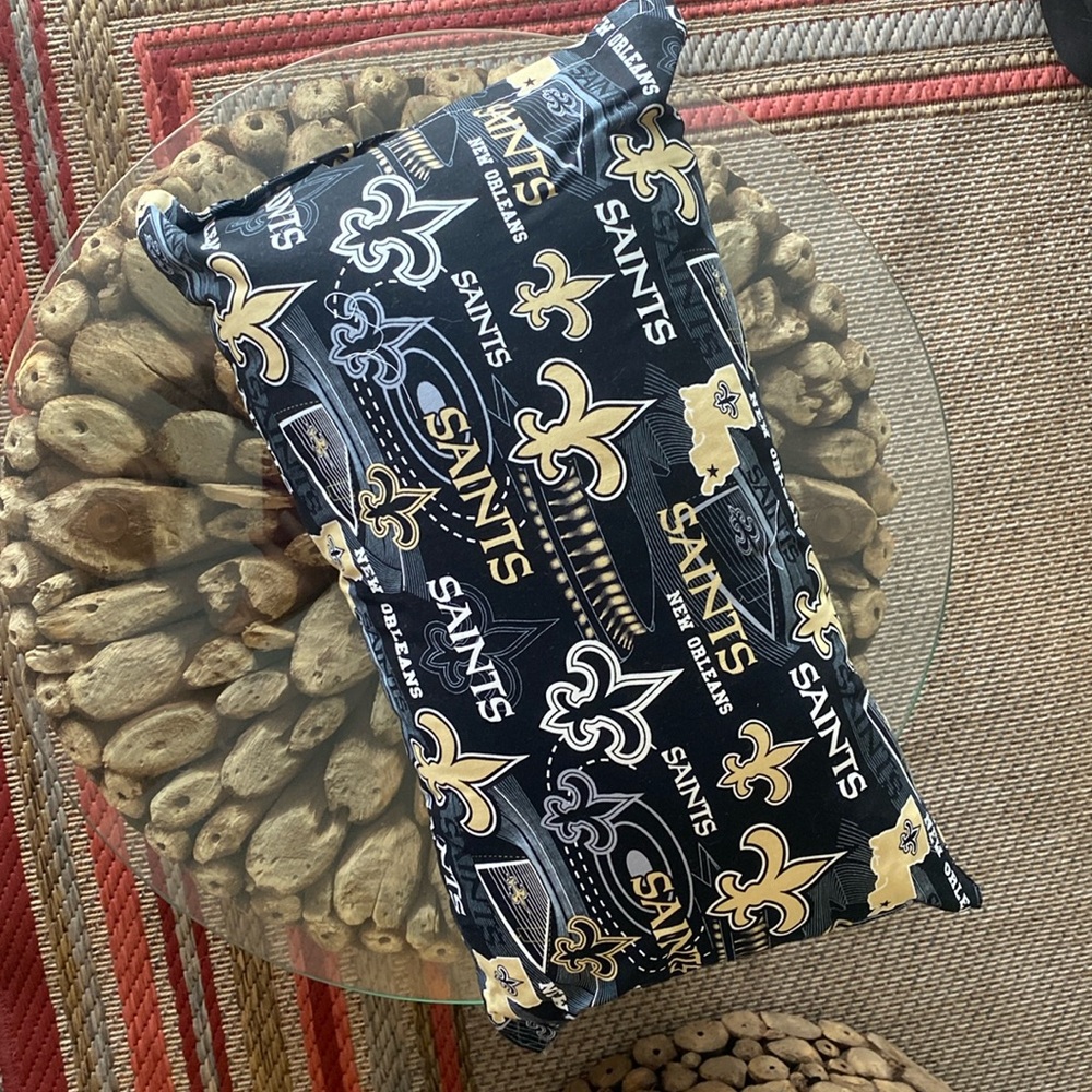 New Orleans Saint themed throw pillow 15x 10 inches; $10 each